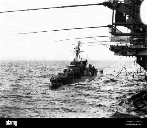 USS English (DD-696) refueling from USS Independence (CVA-62) in ...