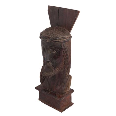 Tribal Male Statue In An Unconventional Style