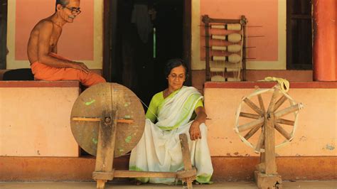 Spinning thread in Charkha | Download Royalty-Free High-Resolution Images