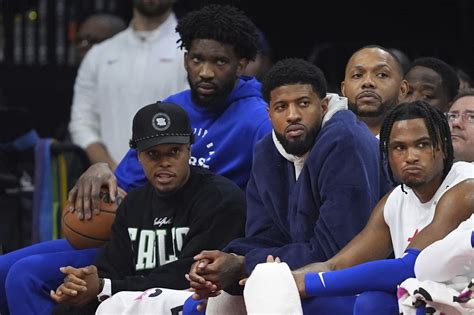 NBA: Injured Embiid, Paul George watch from 76ers' bench again