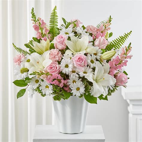 Floor baskets & pedestal arrangements by Flowers By Bauers & Greenhouse ...