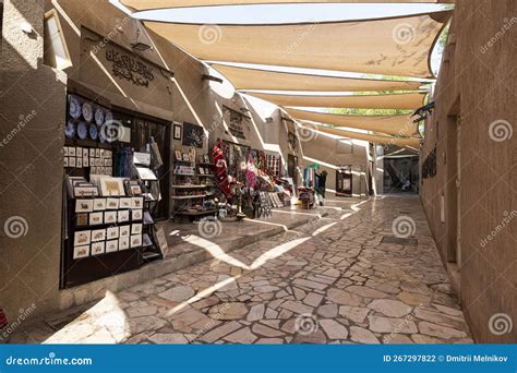 Al Seef Village At Bur Dubai. Al Seef Old Style Area With People. Wooden Promenade On Water ...