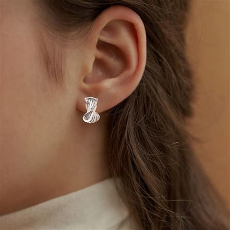 Earrings Online - Premium Metal Hourglass Stud Earrings Silver | Nestasia