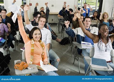 Students Raising Hands in the Classroom Stock Image - Image of ...
