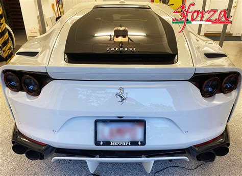 Ferrari 812 Superfast carbon tail lights surround satellites.