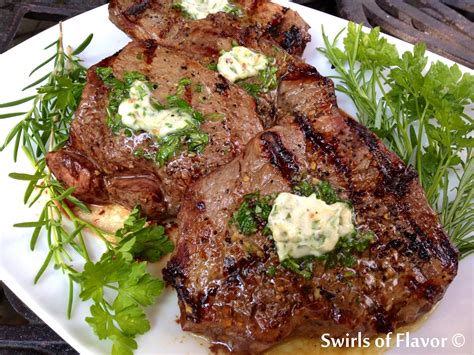 Grilled Sirloin Steaks with Fresh Herb Butter Topping - Swirls of Flavor