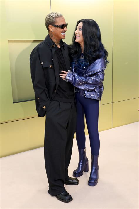 Cher, boyfriend Alexander 'AE' Edwards kiss during red carpet debut