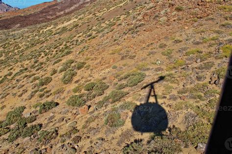 volcanic landscape with a cable car to the top of the mountain of the ...