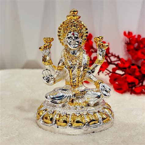 Antique Silver Lakshmi Idol. Coated with 24 carat gold and silver ...