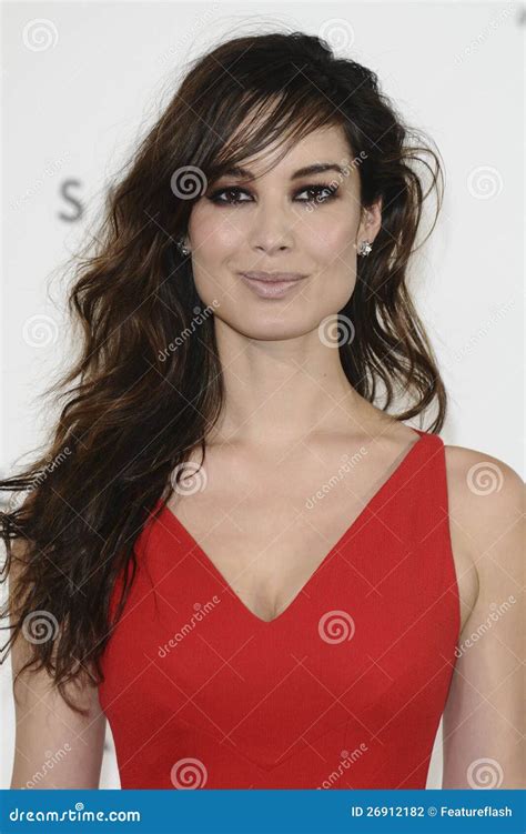 Berenice Marlohe,James Bond Editorial Photography - Image of 03112011, restaurant: 26912182