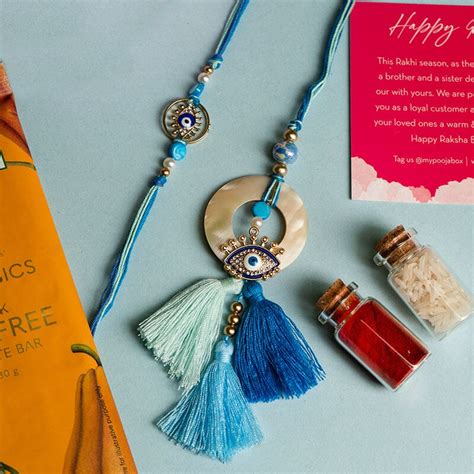 Buy Pretty Evil Eye Tassle Bhaiya Bhabhi Rakhi Online in India ...