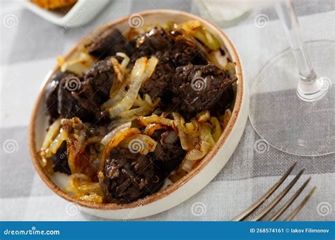 Traditional Spanish Morcilla Blood Sausage Served with Onions Stock ...