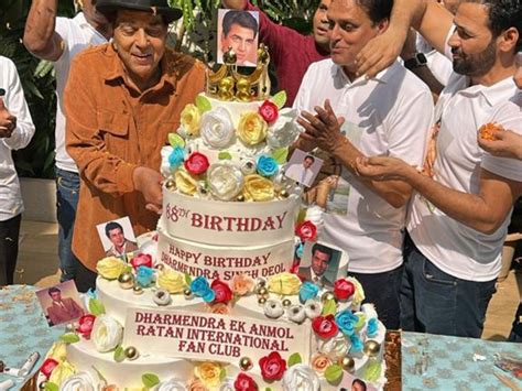 Dharmendra cuts giant 7-tier cake on his 88th birthday poses with Sunny ...