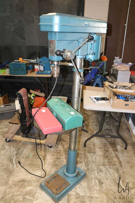 Rexon 12 speed, floor standing drill press with accessories and swivel ...