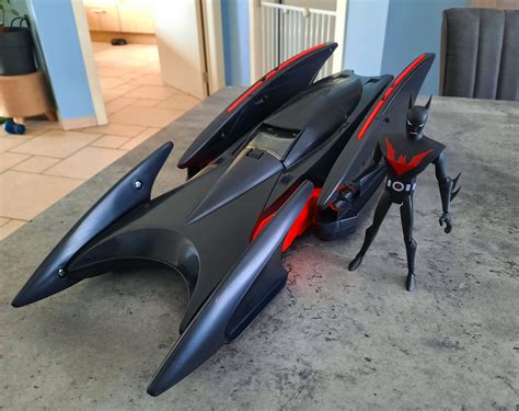 I recently picked up the old Hasbro Batman Beyond Batmobile for a steal ...