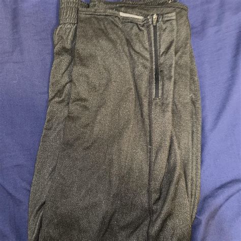 Dark grey under armor sweats Couple small holes - Depop