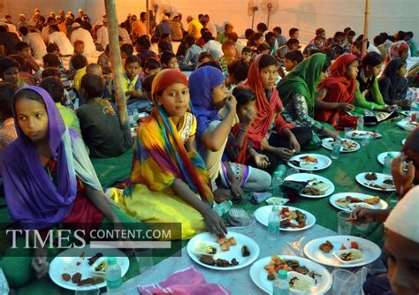 Iftar Party Feature Photo Muslims break their fast at a...