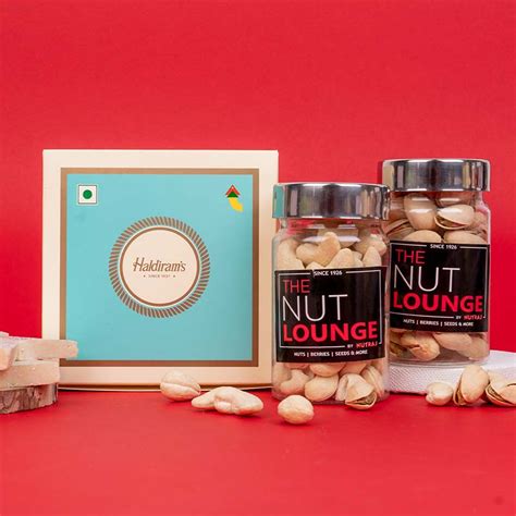 Send Set of 2 Rakhis with Nut Lounge Dry Fruits and Chocolate Box ...