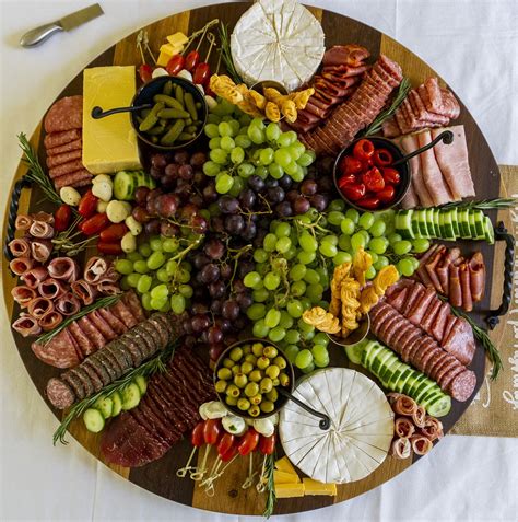 ROUND FRENCH ROASTED OAK CHARCUTERIE BOARD WITH WROUGHT IRON HANDLES ...