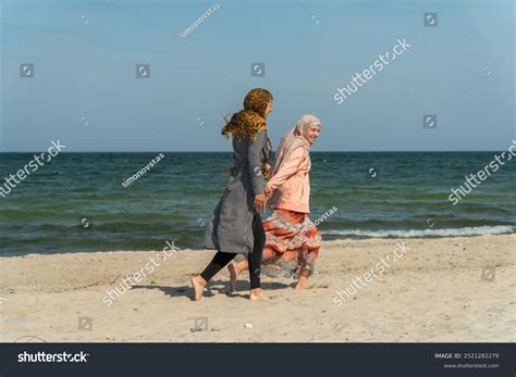 Muslims On Beach Mother Daughter Hijab Stock Photo 2521282279 ...