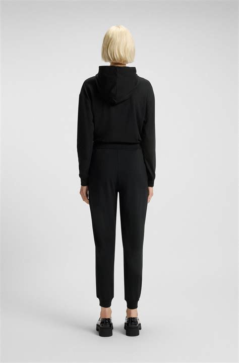 HUGO - Logo-print tracksuit bottoms in stretch modal and cotton - Black