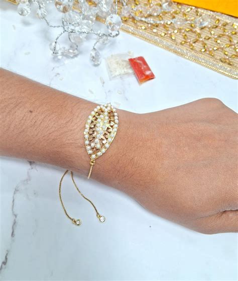 Evileye Look Alike White Jadau Bracelet Rakhi – QUEENS JEWELS