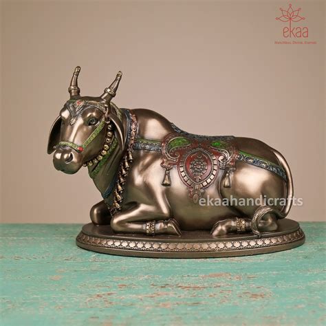 Nandi Cow Sitting Statue in Bonded Bronze – Ekaa Handicrafts