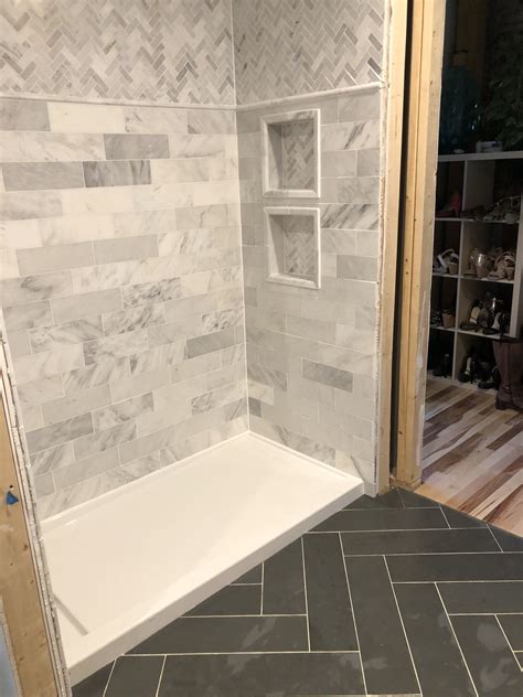 Bathroom progress! 6x24 herringbone slate floor tile; 4x12 marble ...
