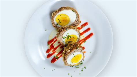 Download Scotch Eggs Dish With Red Sauce And Herbs Wallpaper ...