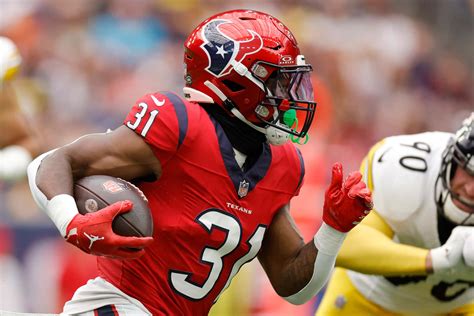 Download Houston Texans Running Back Action Wallpaper | Wallpapers.com