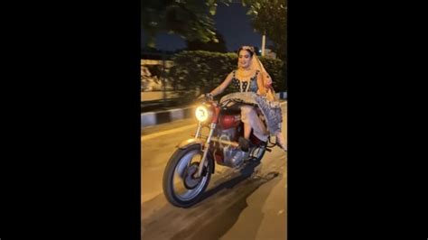 Woman dressed in bridal attire rides Bullet in viral video. Seen it yet ...