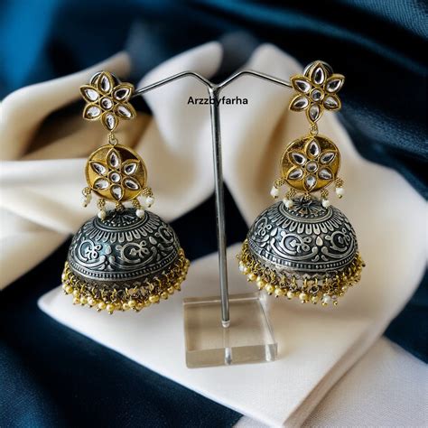 Dual Tone Meena Jhumkas Earrings – Arzzbyfarha