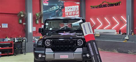 Black car Kia Seltos post Graphene coating