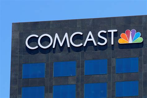 Comcast, Walmart team up to sell smart TVs with the media firm's software | Reuters