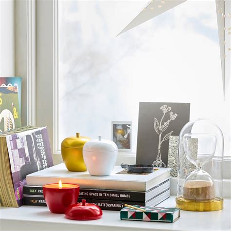 VINTERFINT scented candle in metal tin, apple-shaped/Vanilla white, 24 ...