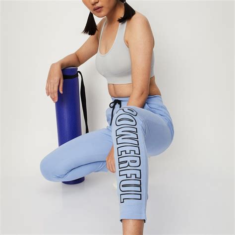 Buy Women Typographic Printed Track Pants Online at just Rs. 699.0 ...