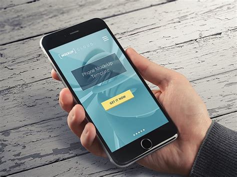 iPhone 6 Plus in male Hand Mockup - Mockup World