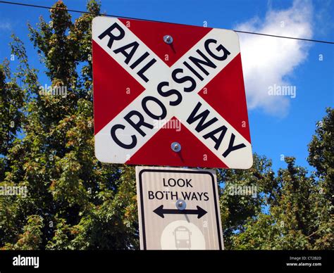 Canada train crossing red hi-res stock photography and images - Alamy