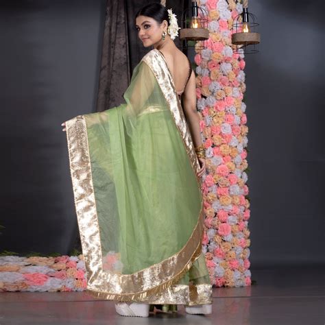 Green organza saree with gold gota border and fringe lace – Boveee
