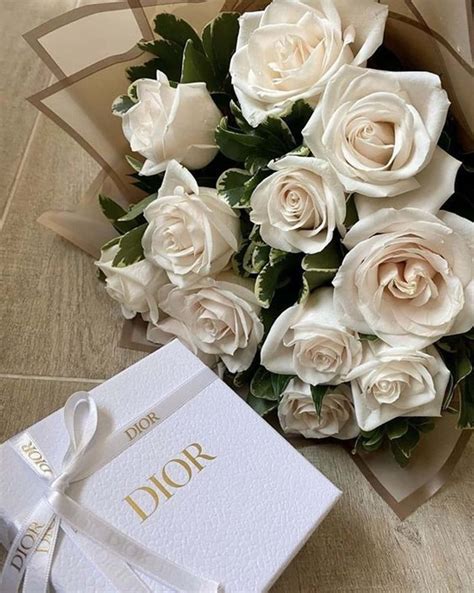 Download Dior White Roses Aesthetic Bouquet Wallpaper | Wallpapers.com