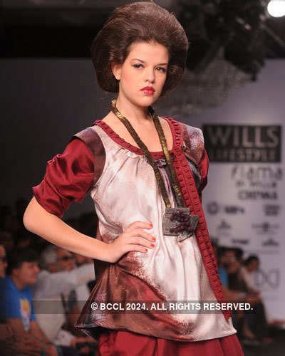A model presents a creation by designer Ashish N Soni during Day 5 of ...