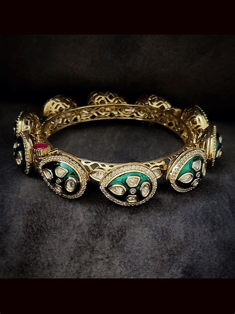 Set of two openable leaf shaped top with green enamel uncut polki pach ...