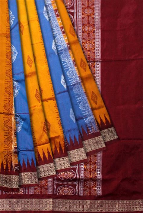 Bomkei pata saree in yellow, sky and maroon color base.