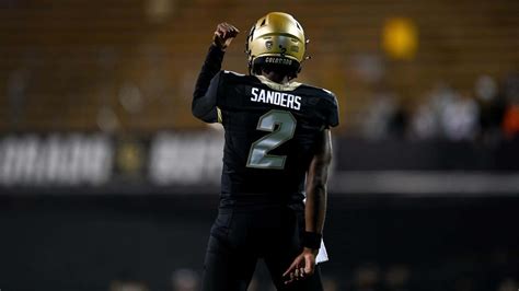 Download Shedeur Sanders Football Game Moment Wallpaper | Wallpapers.com