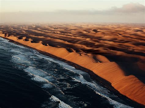 High Sand and High Seas | National geographic photos, Namib desert ...