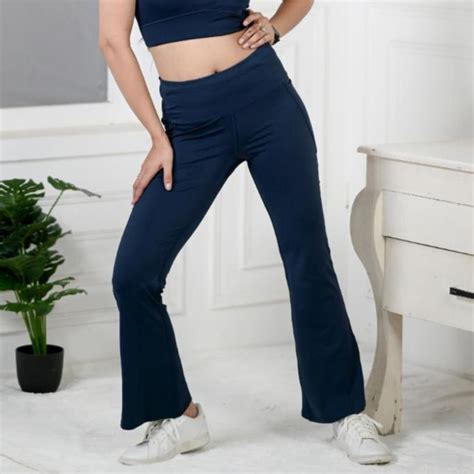 Light blue gym flare pants for women, ankle length sports pants.