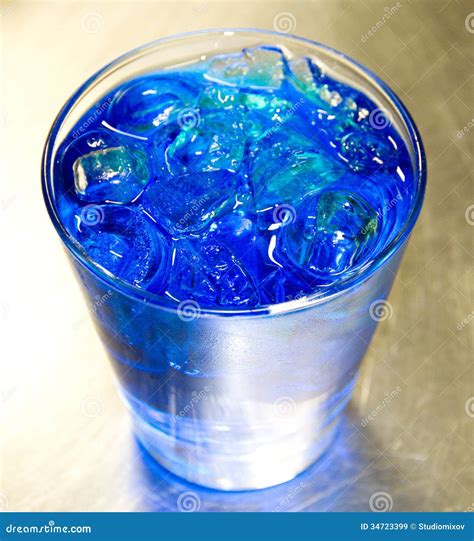 Blue alcohol cocktail stock image. Image of closeup, liquor - 34723399