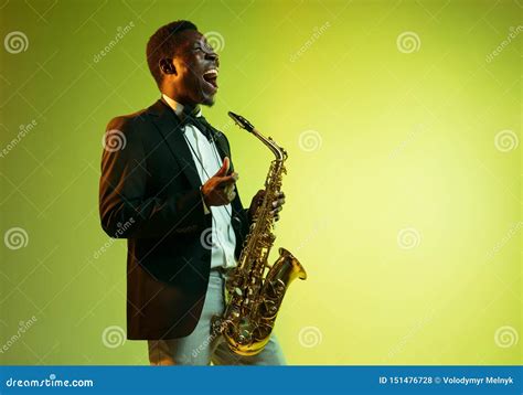 Young African-american Jazz Musician Playing the Saxophone Stock Photo ...