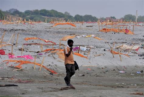 Shrouds removed from bodies buried at banks of Ganga in Uttar Pradesh's ...