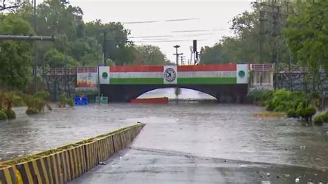 Delhi School Bus Gets Stuck in Waterlogged Minto Bridge Underpass ...